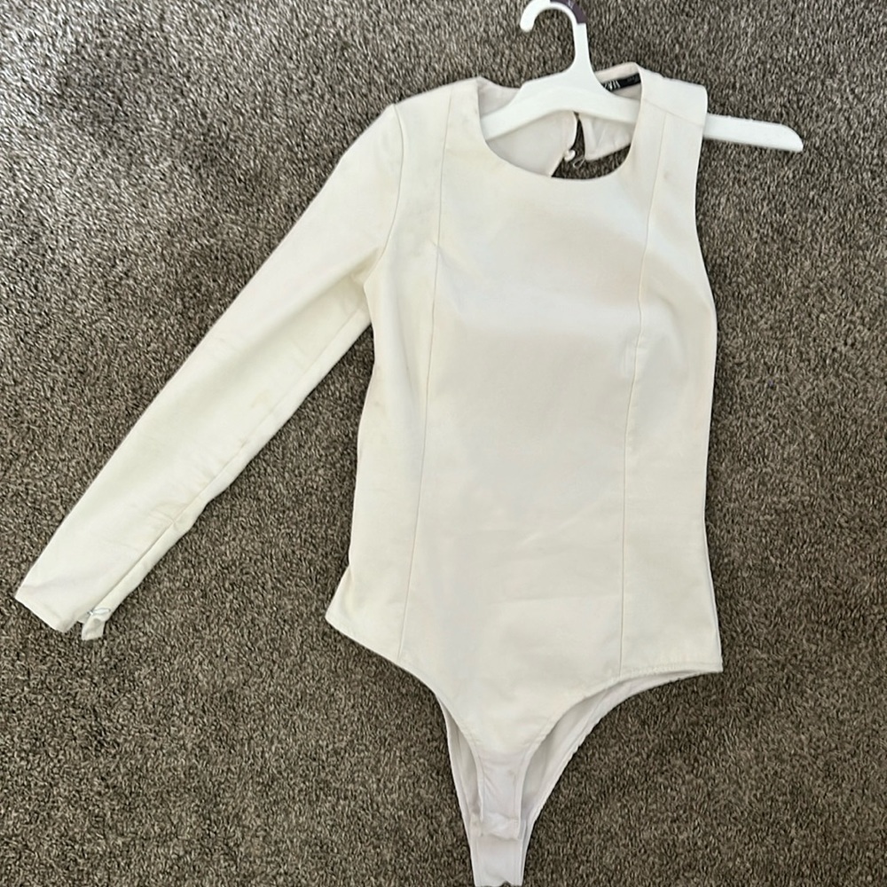Long sleeve open back body suit